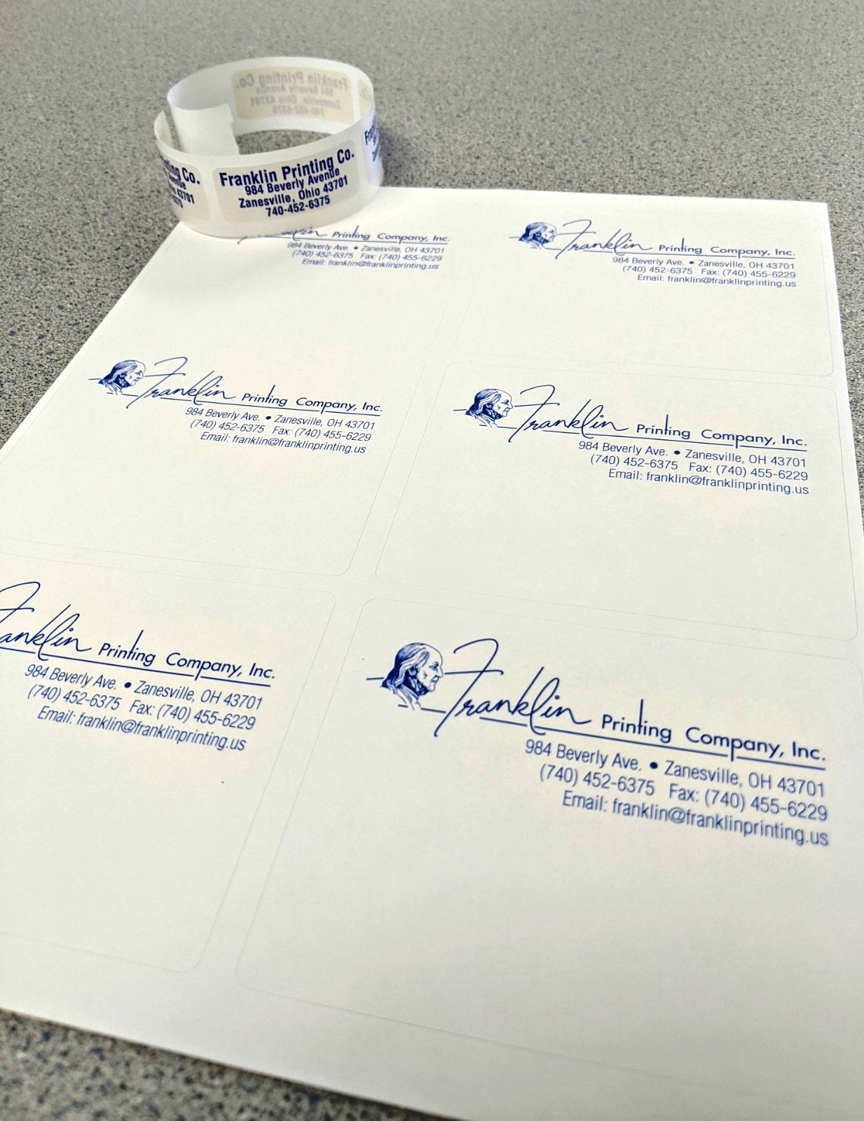 Sheet of die-cut Franklin Printing return-address stickers